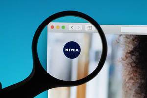 Nivea logo under magnifying glass