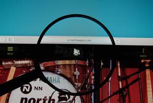 North Sea Jazz Festival website on a computer screen with a magnifying glass