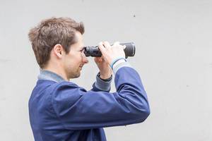 Observation: man with binoculars