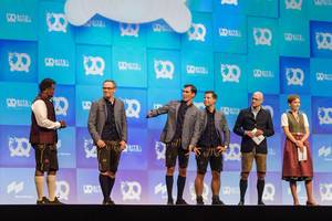 Oktoberfest atmosphere with traditional dresses of the hosts and founders of start-up-conference Bits & Pretzels 2019 in Munich