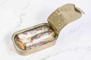 Opened-Canned-Sardines-Fish-on-the-table.jpg