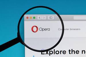 Opera logo under magnifying glass
