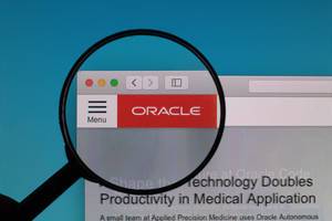 Oracle logo under magnifying glass