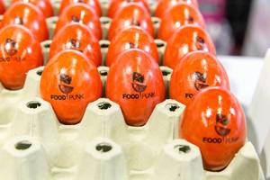 Orange eggs in egg cup offered by FoodPunk, an app for special diets at Fibo Cologne