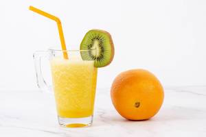 Orange juice in the glass with Kiwi (Flip 2019)