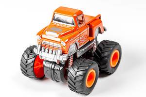 Orange toy car with big wheels (Flip 2020)