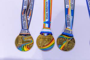 Osaka Marathon tradition to celebrate diversity with gay flag colors on runners medals