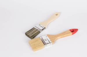 Paint brushes on white background