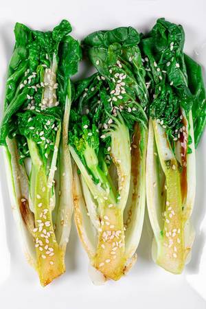 Pak Choi baby cabbage with sauce and sesame seeds