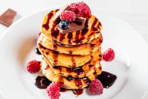 Pancakes with fresh fruit and chocolate