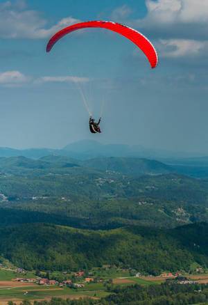 Paragliding over beautiful landscape