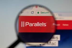 Parallels logo on a computer screen with a magnifying glass