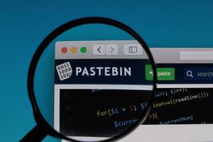 Pastebin logo under magnifying glass