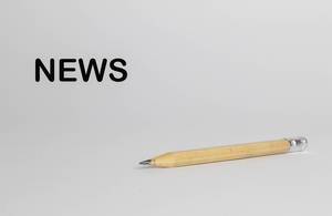 Pencil with news text