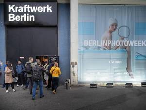 People rushing toward the entrance of photography event – Berlin Photo Week.jpg