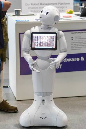 Pepper Roboter by Humanizing Technologies created for human interactions and business usage with touchscreen display, can talk, listen, move and dance