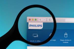 Philips logo under magnifying glass