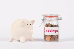 Piggy bank and money jar with savings text