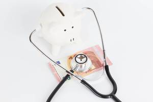 Piggy bank with a stethoscope
