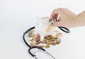 Piggy bank with stethoscope for check your finance