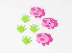 Pigs with green grass