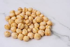 Pile of Chickpeas on the marble table (Flip 2019)