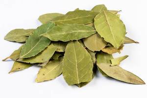 Pile of Dried Baf Leafs on the white background