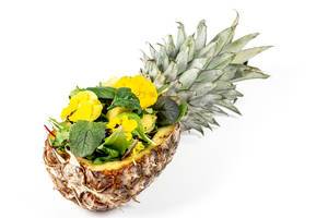 Pineapple stuffed with mix of different lettuce leaves and edible flowers (Flip 2020)