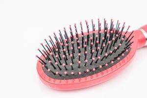 Pink Comb Brush for girls above white background