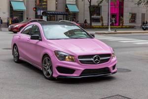 Pink Mercedes car on the streets of Downtown Chicago