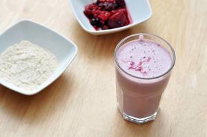 Pink Smoothie with protein powder and red berries
