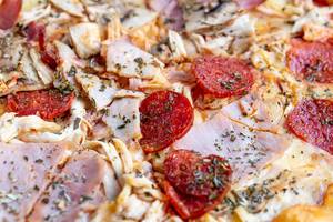 Pizza-with-smoked-cured-sausage-close-up.jpg