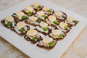 Plate Of Anchovies And Egg Canape Snacks