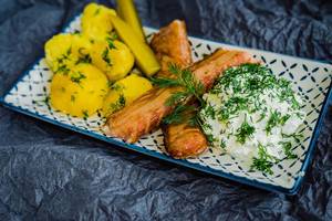 Plate Of Fresh Smoked Salmon With curd And Potatoes