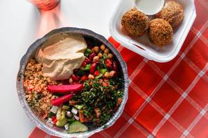 Plate of Libanese food with Couscous, Beans, Falafel and Hummus