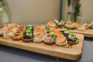 Plate Of Salmon, Pork, Bread Canapes
