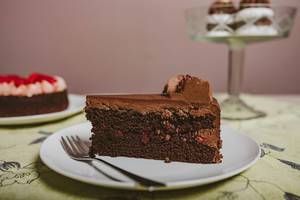 Plate with slice of tasty homemade chocolate cake (Flip 2019)