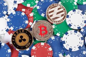 Poker chips with cryptocurrency coins
