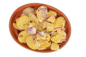 Potatoe Salad with sliced Onions above white background (Flip 2019)