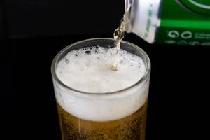 Pouring Heineken Canned Beer in the glass (Flip 2019) (Flip 2019)