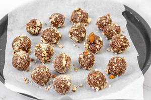 Preparing heatly Oatmeal energetic cookie balls with grated Almonds (Flip 2019)