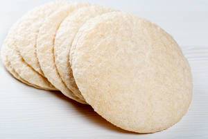 Puffed rice bread on white background