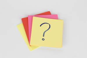 Question mark on sticky note