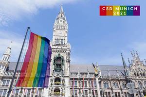 Raised rainbow flags in front of the New Town Hall at Marienplatz in Munich, with the title "CSD Munich 2021", to show solidarity with Christopher Street Day