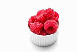 Raspberries Close-Up on a White Background