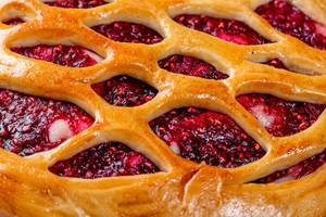 Raspberry pie with raspberry jam close up