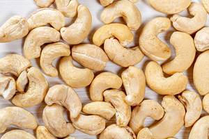 Raw cashews nut background. Top view