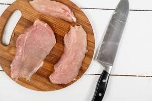 Raw Chicken Breasts on the cutting board (Flip 2020)