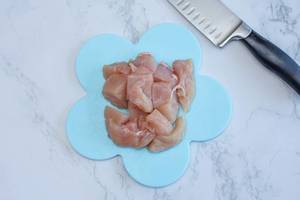 Raw Chicken in Cubes with Knife  (Flip 2019)