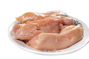 Raw Chicken White Meat prepared for frying